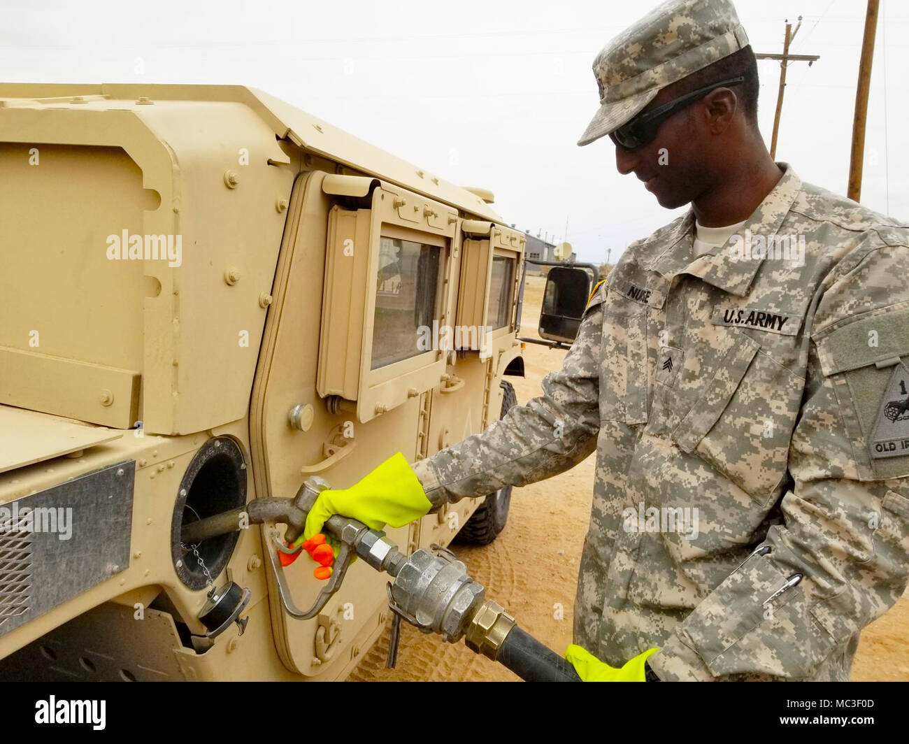 during-a-field-training-exercise-for-the-petroleum-supply-specialist-reclassification-course-at-fort-lee-va-sgt-1st-class-torron-williams-an-instructor-assigned-to-the-94thtraining-division-provides-guidance-to-one
