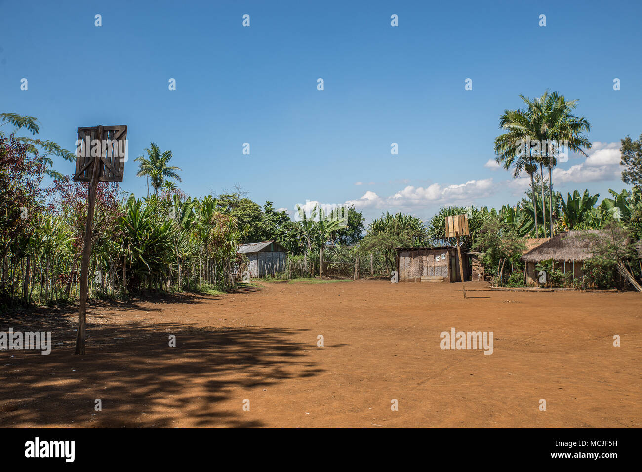 A basketball dusty playground in a remote village, Goroka area, Eastern Higlands Province, Papua New Guinea Stock Photo