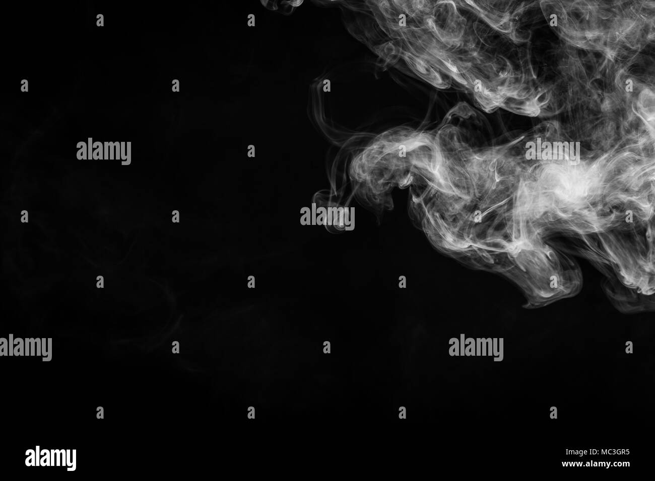 White cloud smoke on black isolated background Stock Photo - Alamy