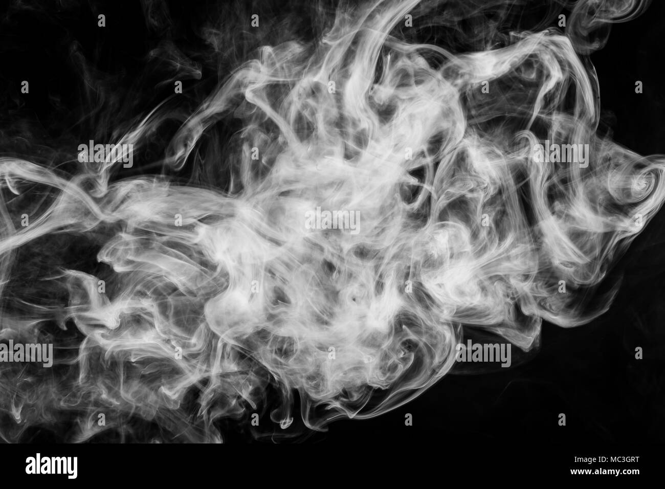 White cloud smoke on black isolated background Stock Photo - Alamy