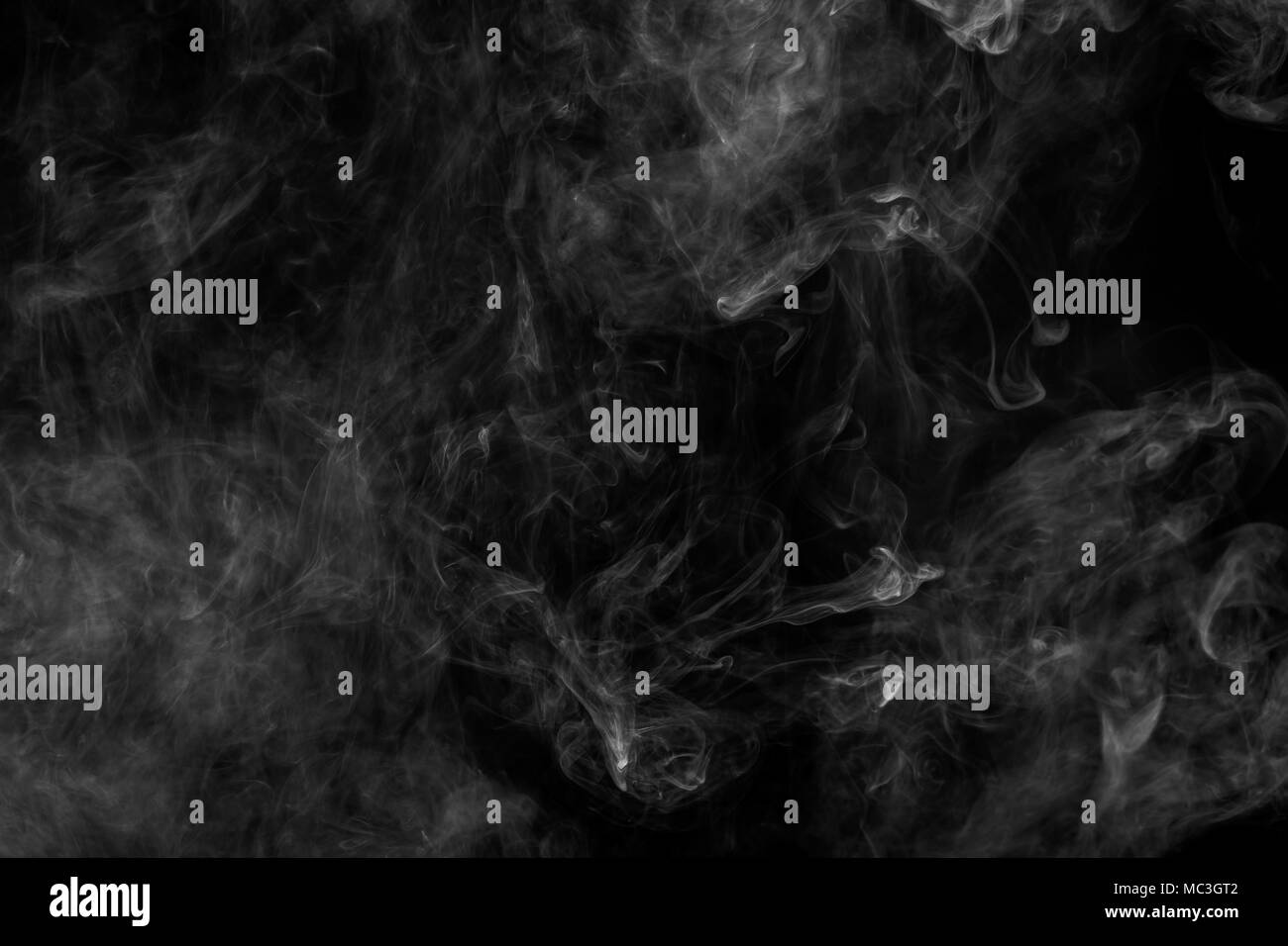 White cloud smoke on black isolated background Stock Photo - Alamy