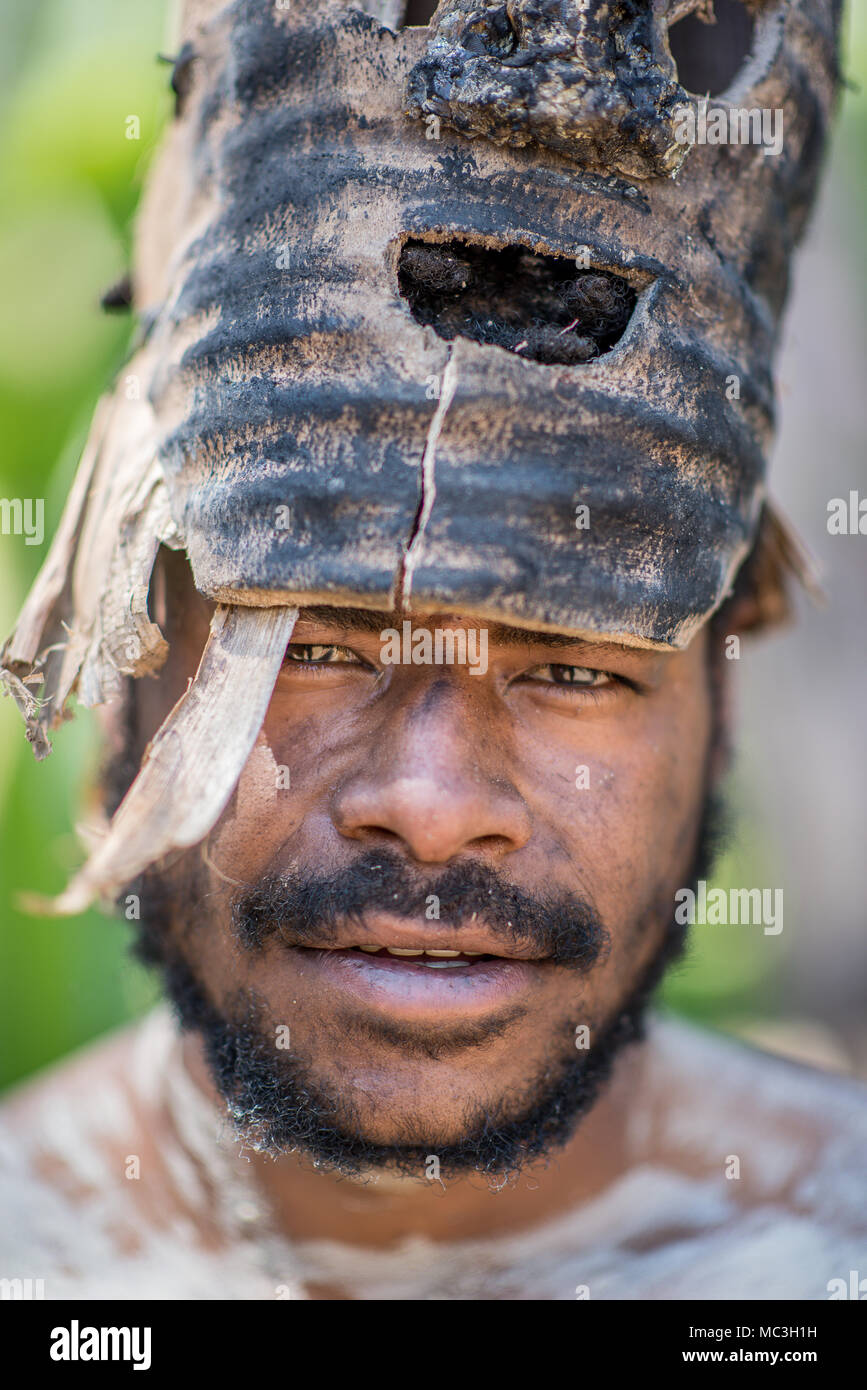 Close-up portrait of a masked firemaking performer, Goroka area, Eastern Highlands Province, Papua New Guinea Stock Photo