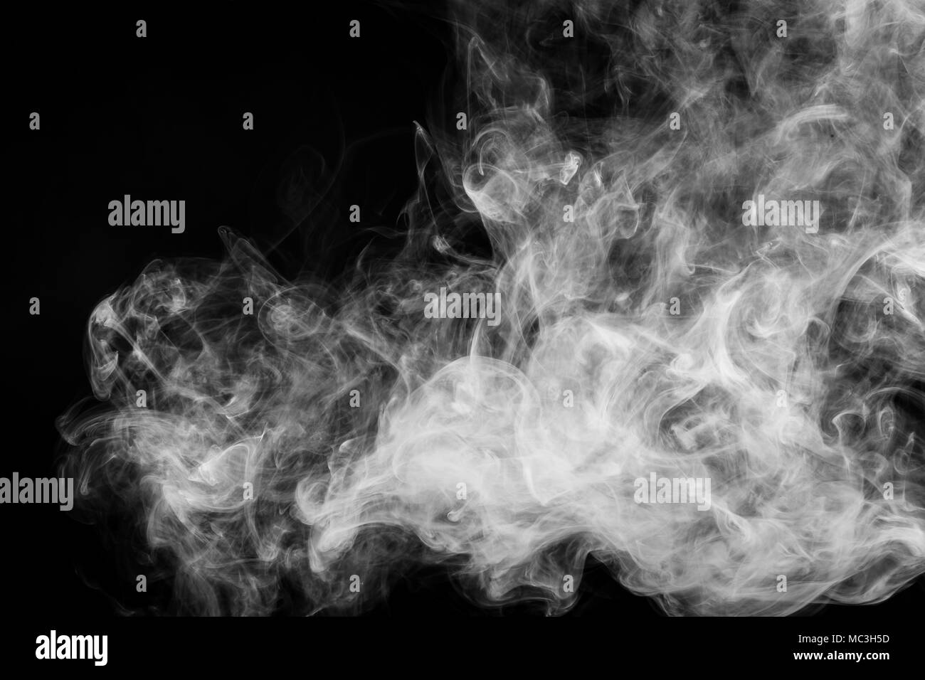 White cloud smoke on black isolated background Stock Photo - Alamy