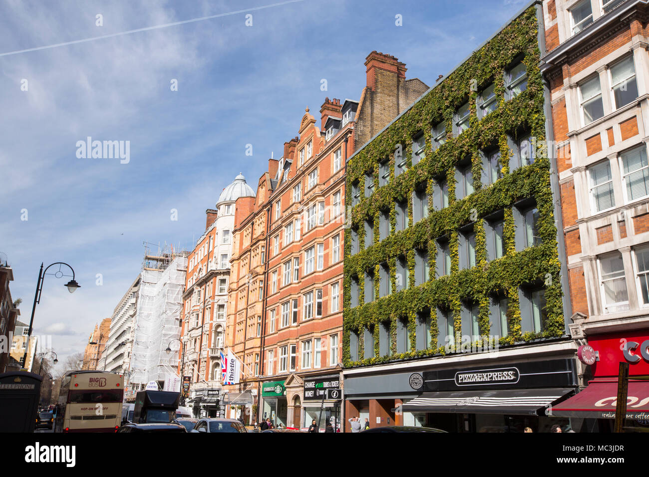 A green fronted building using plants on Kingsway, London, UK. Stock Photo