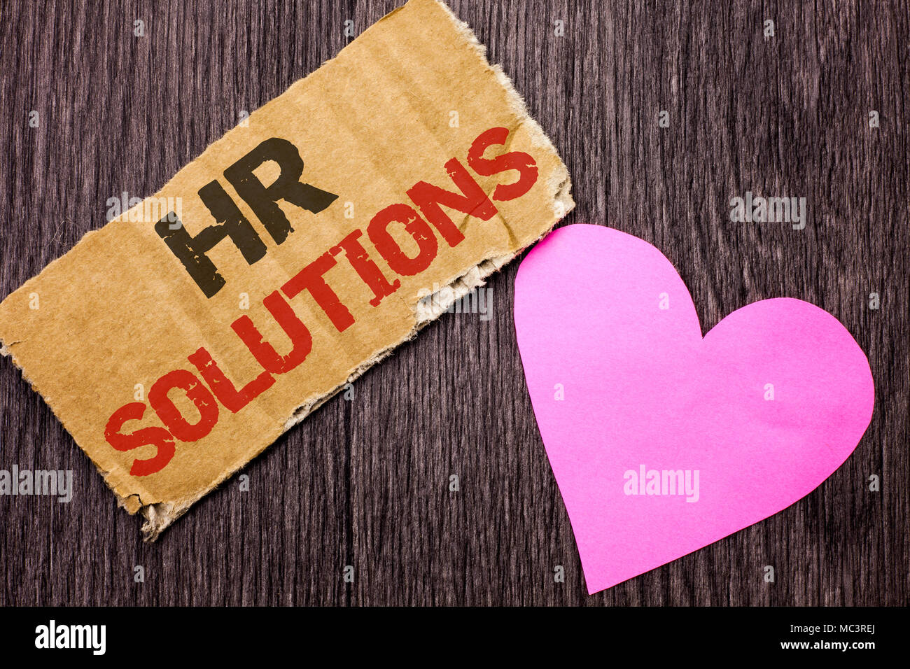 Handwriting text Hr Solutions. Concept meaning Recruitment Solution Consulting Management Solving Onboarding written Cardboard Piece the wooden backgr Stock Photo