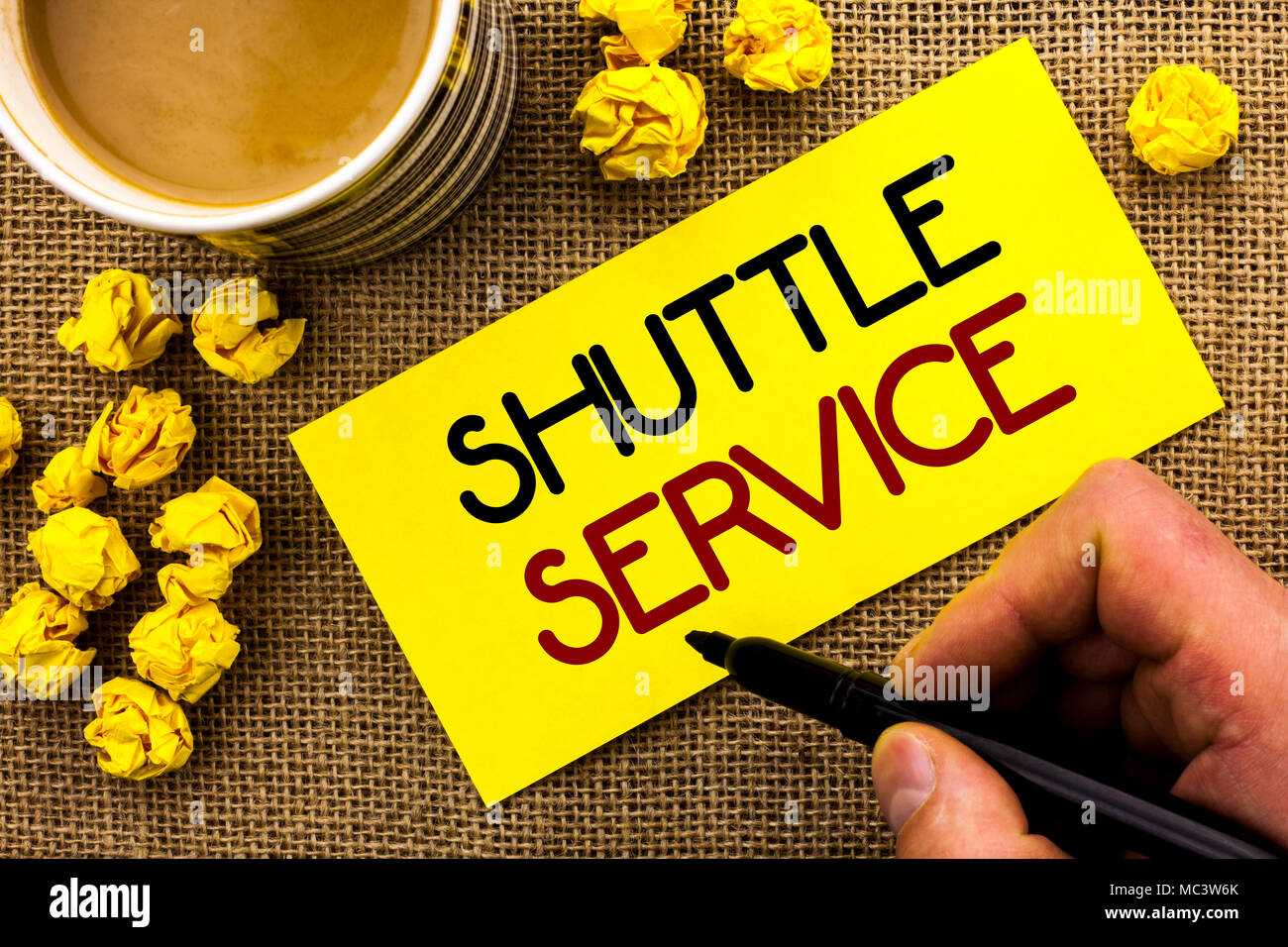 Text sign showing Shuttle Service. Conceptual photo Transportation Offer Vacational Travel Tourism Vehicle written Sticky Note Paper the jute backgrou Stock Photo
