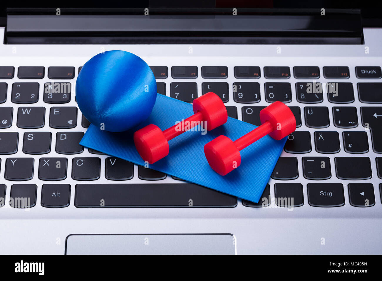 Close-up Of Fitness Ball, Dumbbells And Exercise Mat Stock Photo