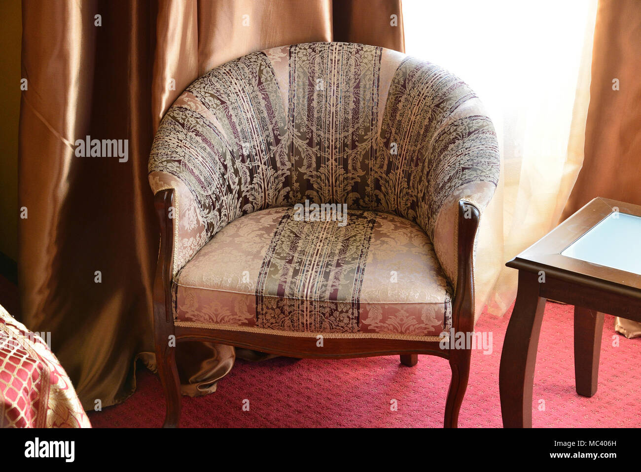 Armchair in interior of the room Stock Photo - Alamy
