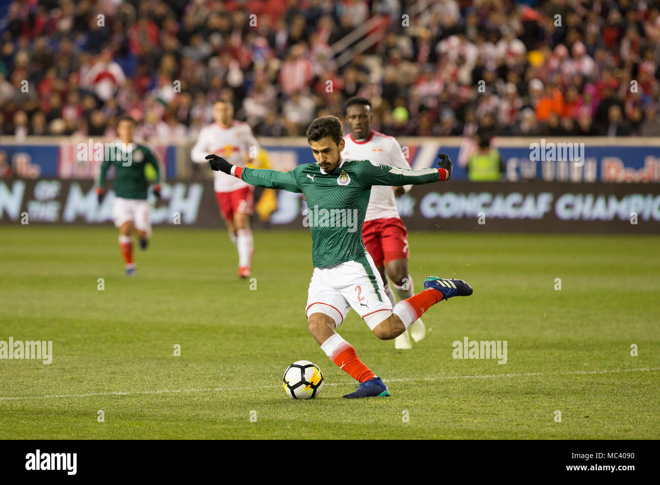 Harrison, United States. 10th Apr, 2018. Oswaldo Alanis (2) of CD Guadalajara kicks ball during Scotiabank Concacaf Champions League semifinal against Red Bulls at Red Bull Arena game ended in draw 0 - 0 (1 - 0 aggregate for Guadalajara) Credit: Lev Radin/Pacific Press/Alamy Live News Stock Photo