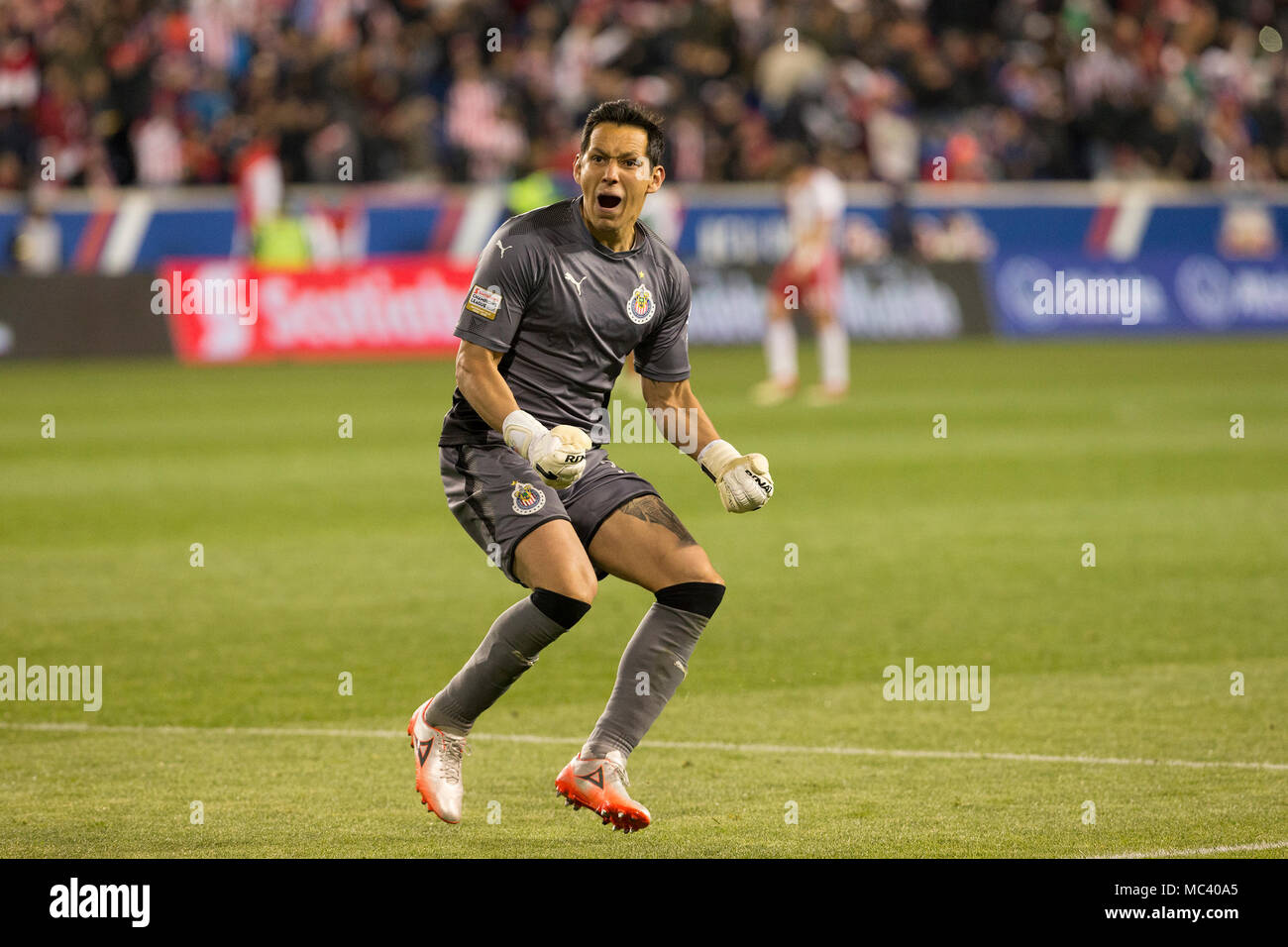 Harrison, United States. 10th Apr, 2018. Goalkeeper Rodolfo Cota (30) of CD Guadalajara celebrates winning Scotiabank Concacaf Champions League semifinal against Red Bulls at Red Bull Arena game ended in draw 0 - 0 (1 - 0 aggregate for Guadalajara) Credit: Lev Radin/Pacific Press/Alamy Live News Stock Photo