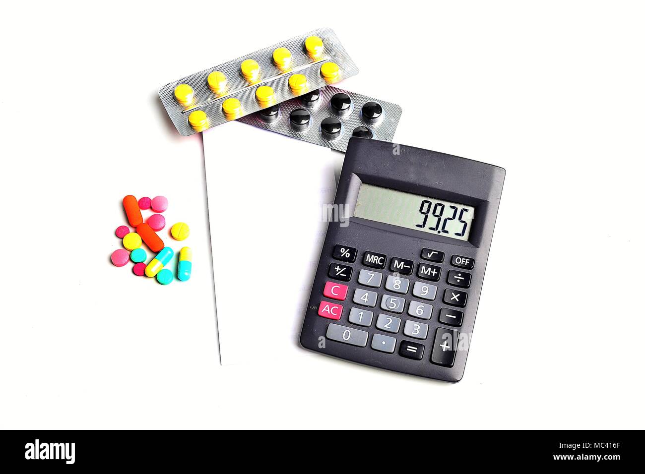 pills tablet with bill receipt calculator Stock Photo