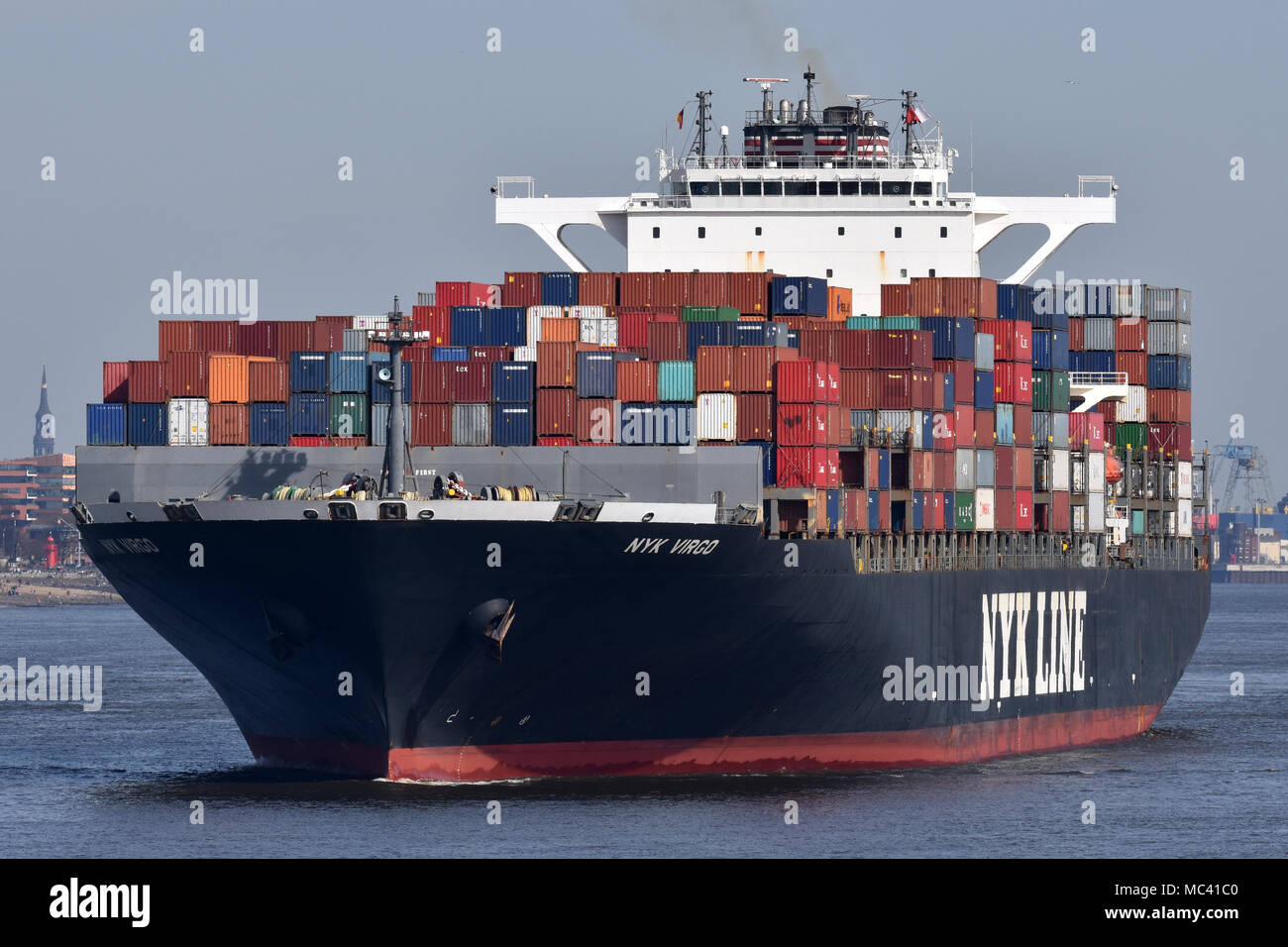 NYK Virgo leaving port of Hamburg Stock Photo