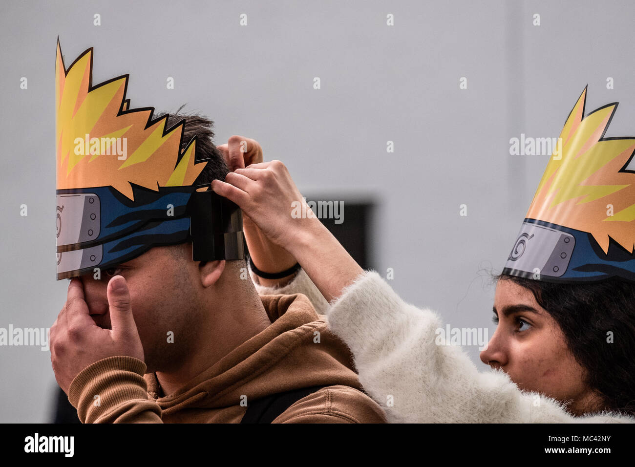 Visitors seen wearing a crown from the Naruto comic. Opening of the 36th Barcelona International Comic Fair from 12th-15th April 2018 in Fira Barcelona Montjuïc. Stock Photo