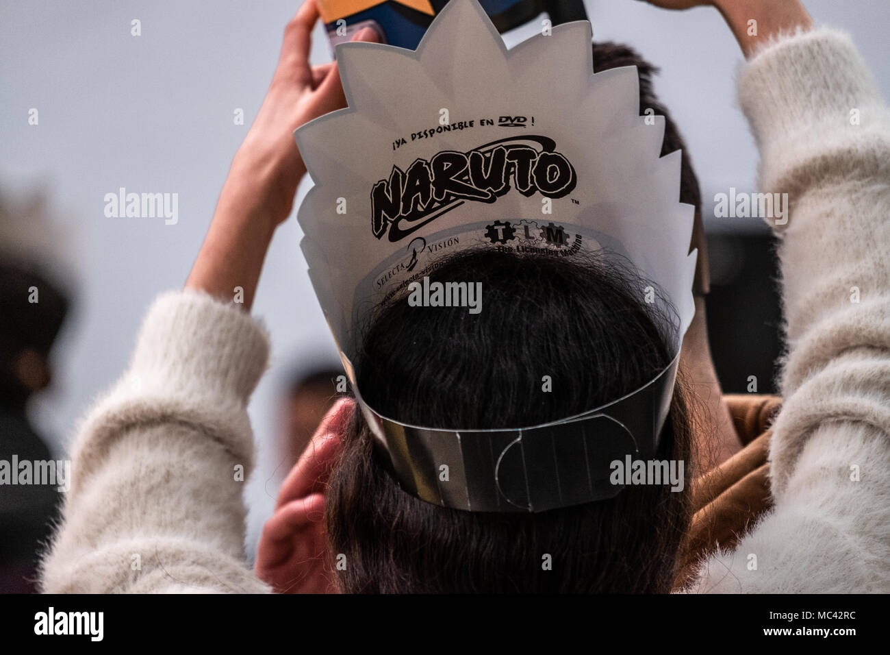 A visitor is seen wearing a crown of the Naruto comic. Opening of the 36th Barcelona International Comic Fair from 12th-15th April 2018 in Fira Barcelona Montjuïc. Stock Photo