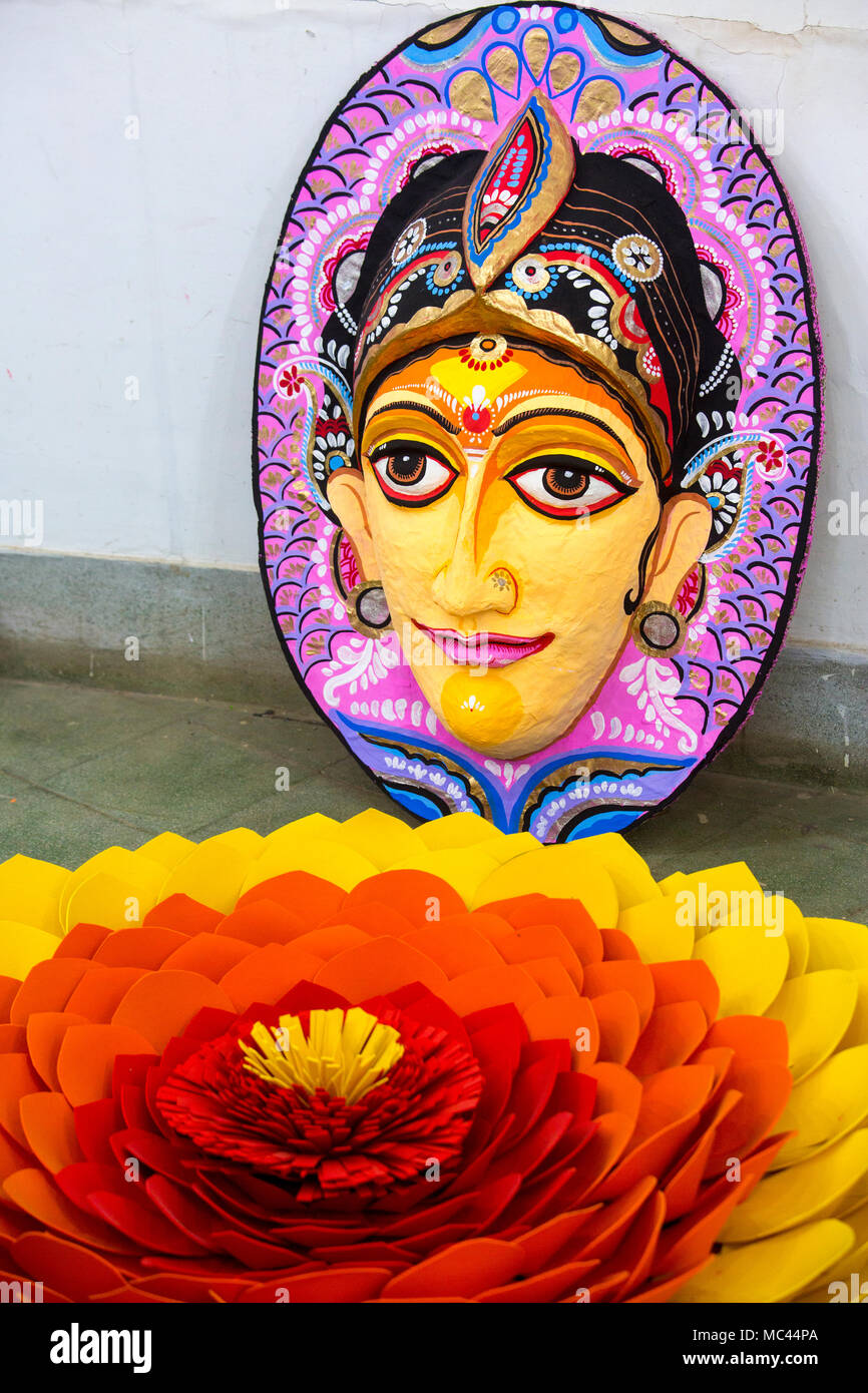 Dhaka, Bangladesh. 12th Apr, 2018. Dhaka University Fine Arts (FFA) student paints a mural to celebrate upcoming Bengali New Year 1425 in Dhaka. Preparations are underway for the festivities Pahela Boishakh. People make crafts for the celebrations. Pahela Boishakh (the first day of the Bangla month) can be followed back to its origins during the Mughal period when Emperor Akbar introduced the Bangla calendar to streamline tax collection while in the course of time it became part of Bengali culture and tradition. Credit: Jahangir Alam Onuchcha/Alamy Live News Stock Photo