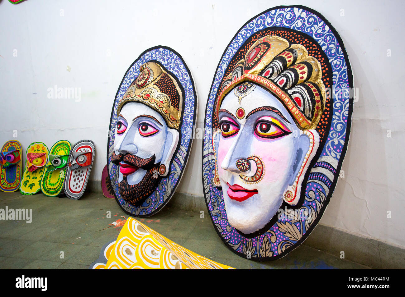 Dhaka, Bangladesh. 12th Apr, 2018. Dhaka University Fine Arts (FFA) student paints a mural to celebrate upcoming Bengali New Year 1425 in Dhaka. Preparations are underway for the festivities Pahela Boishakh. People make crafts for the celebrations. Pahela Boishakh (the first day of the Bangla month) can be followed back to its origins during the Mughal period when Emperor Akbar introduced the Bangla calendar to streamline tax collection while in the course of time it became part of Bengali culture and tradition. Credit: Jahangir Alam Onuchcha/Alamy Live News Stock Photo