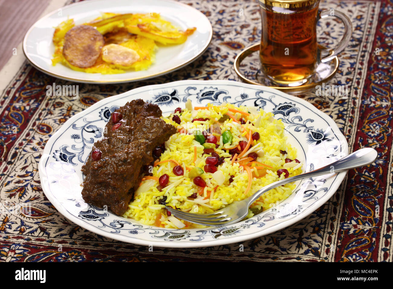 iranian cuisine, persian jeweled rice and chicken fesenjan, potato