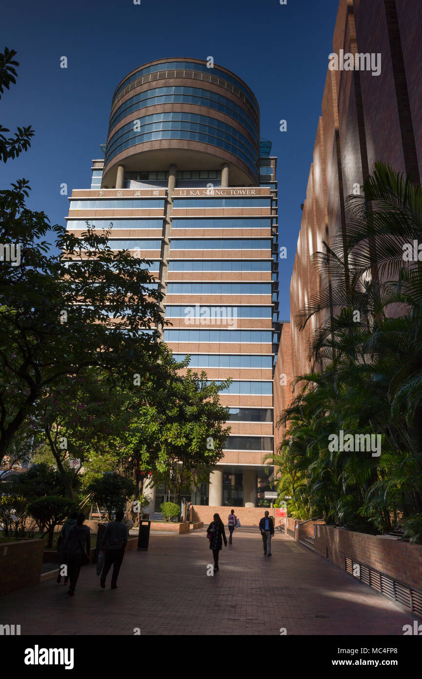 Li Ka Shing Tower in The Hong Kong Polytechnic University, Hung Hom, in bright sunlight with blue sky behind Stock Photo