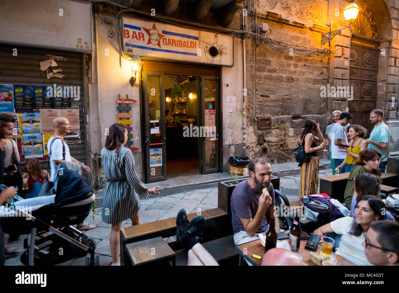 Aperitif time in Via Paternostro. The famous Garibaldi bar Stock Photo