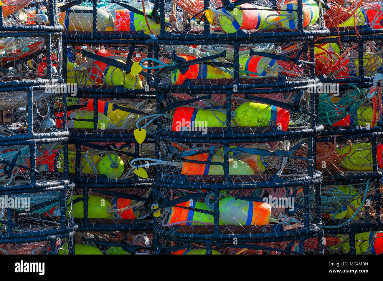 Stacks of Crab Pots sits on Pier in Astoria, Oregon Stock Photo