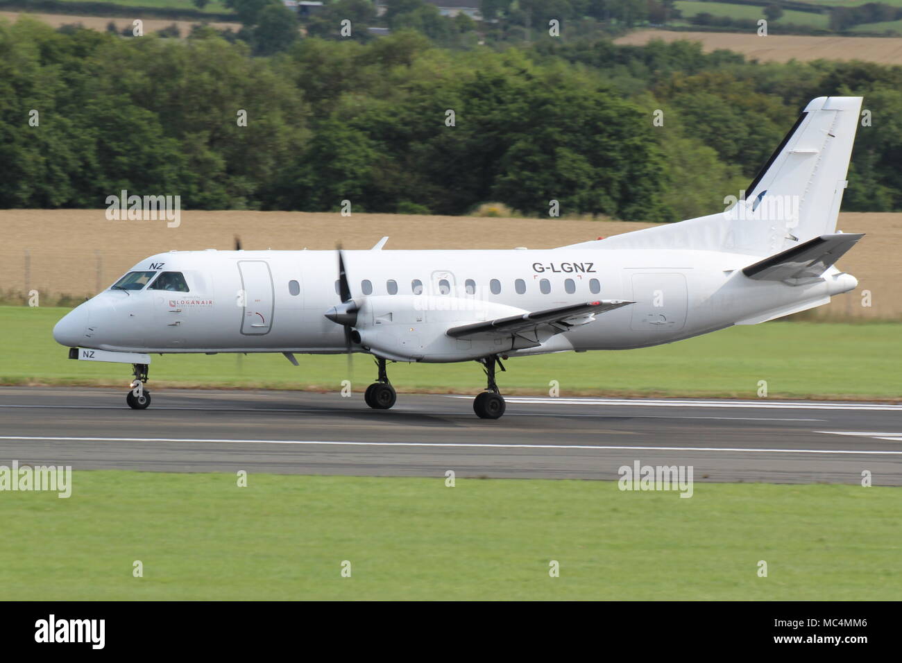 G-LGNZ, a Saab 340 operated by Loganair, at Pretswick International Airport in Ayrshire, Scotland. Stock Photo