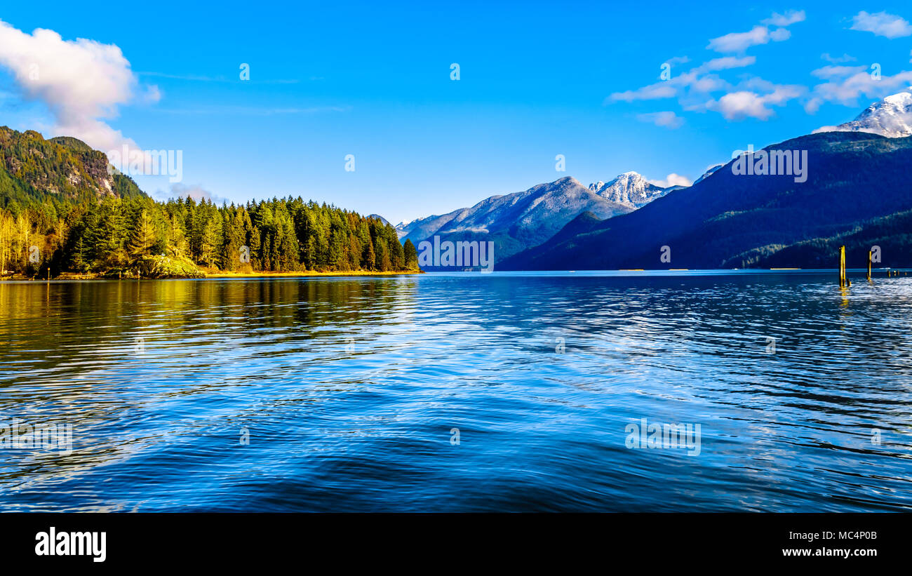 Pitt Lake with the Snow Capped Peaks of the Golden Ears, Tingle Peak and other Mountain Peaks of the surrounding Coast Mountains Stock Photo