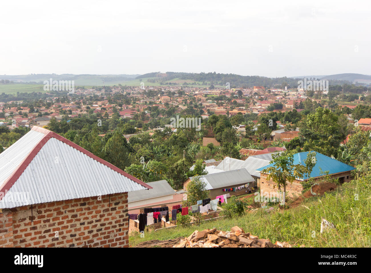 Lugazi, Uganda. June 18 2017. A view of the town of Lugazi and its surroundings from the top of a mountain where a quarry is found. Stock Photo