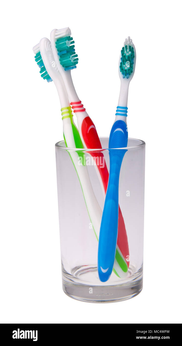 toothbrushes in a glass on background. Stock Photo