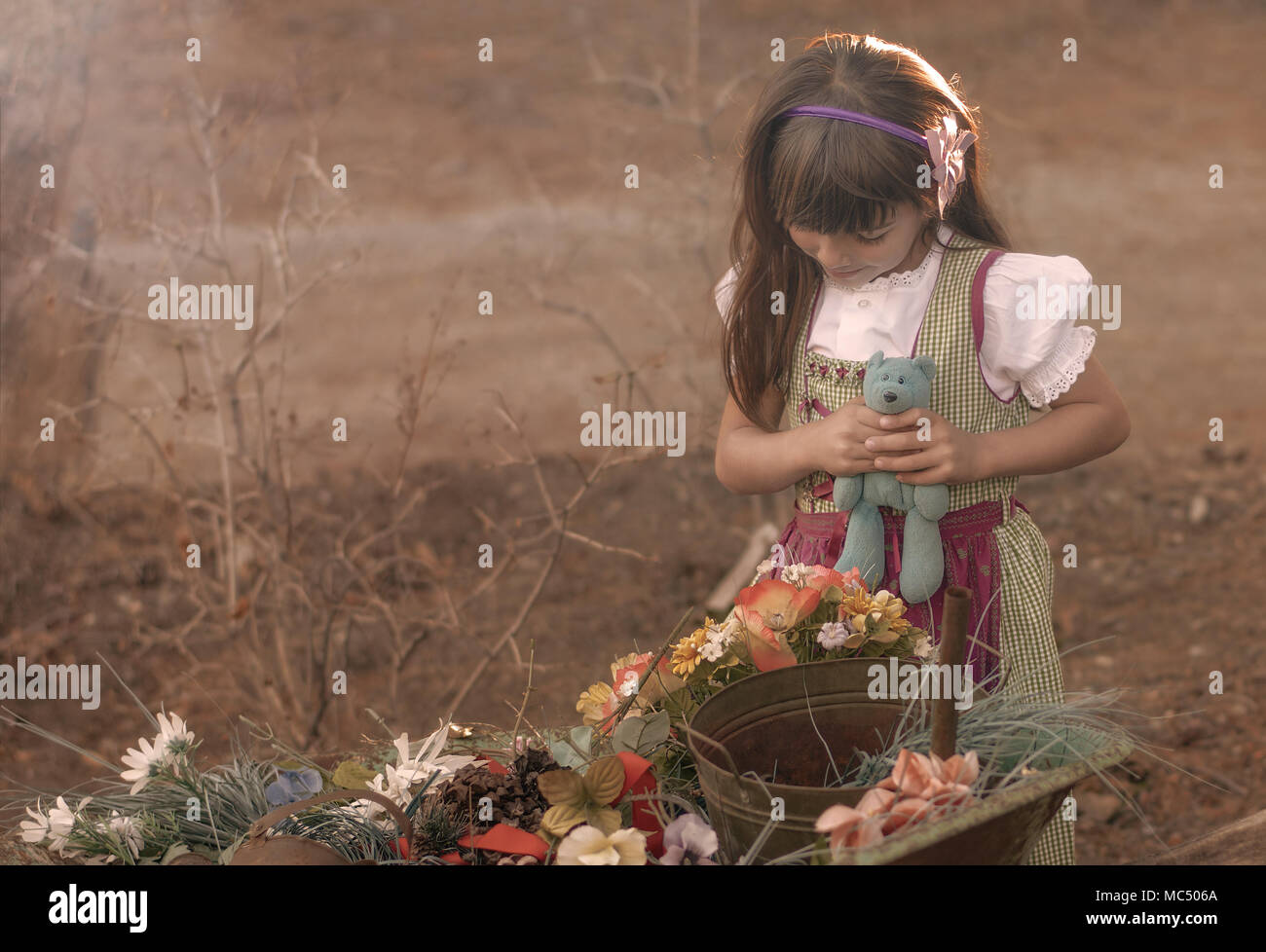 Cute Girl Playing In The Garden Stock Photo