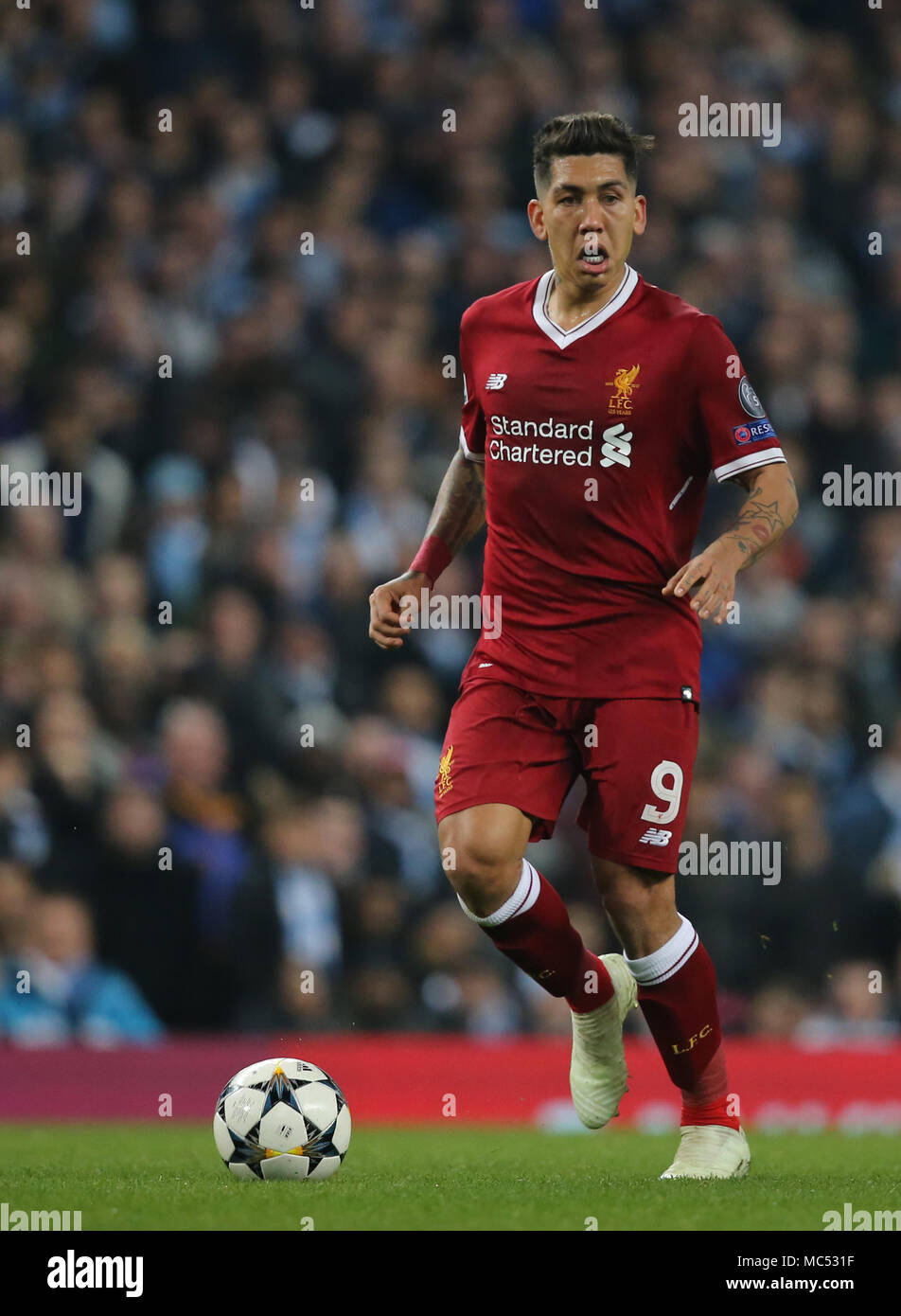 MANCHESTER, ENGLAND - APRIL 10: Roberto Firmino of Liverpool during the Champions League quarter final second leg match between Manchester City and Liverpool at the Etihad Stadium on April 10, 2018 in Manchester, United Kingdom. Stock Photo