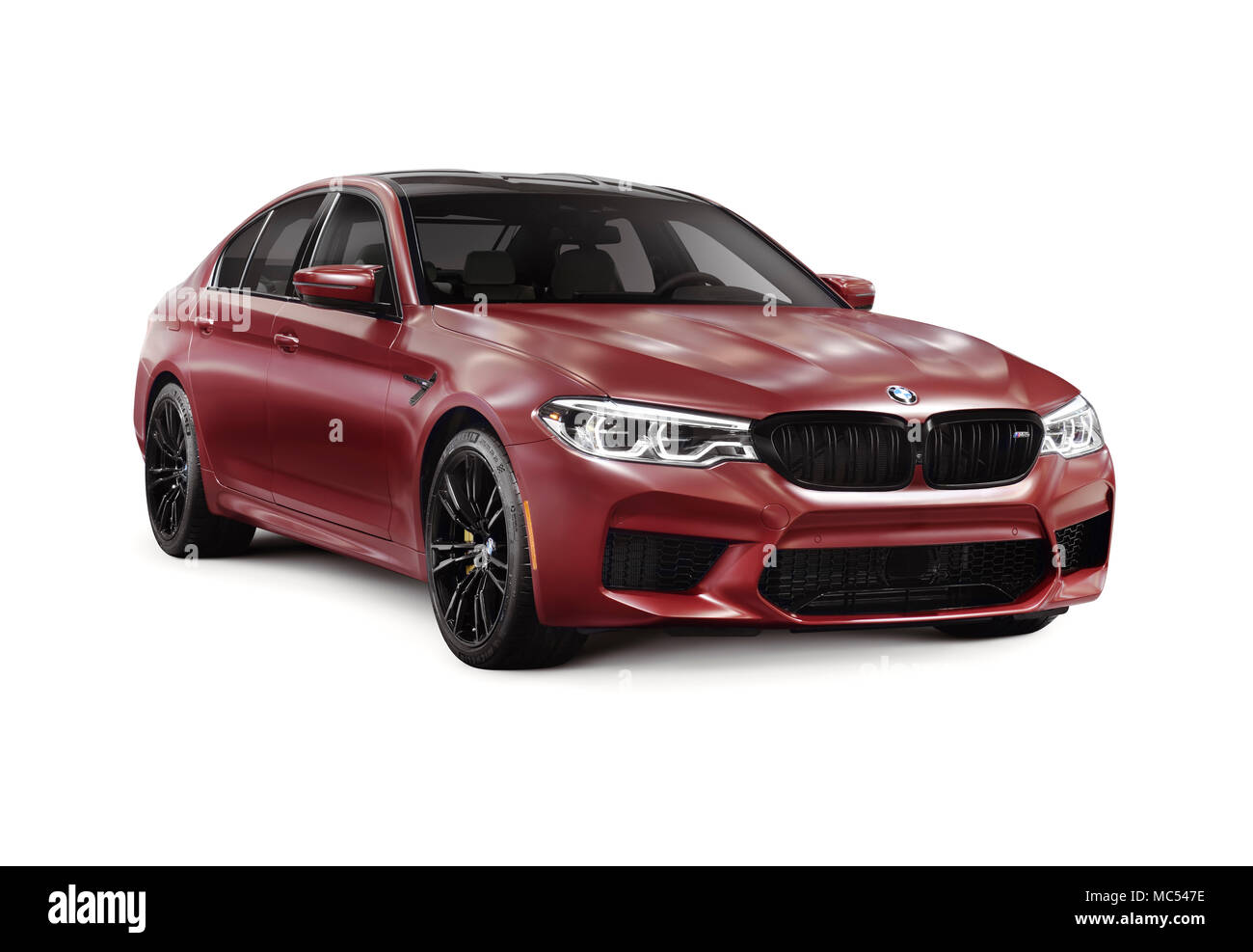 License available at MaximImages.com - Sixth-generation BMW M5 with M xDrive, 2018 performance car, luxury sport sedan, 5-series in dark red, burgundy Stock Photo
