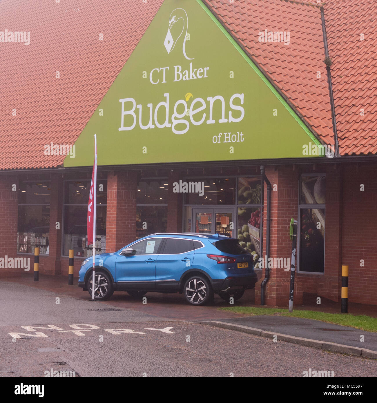 Budgens supermarket shop store in Holt , Norfolk , England , Uk Stock Photo