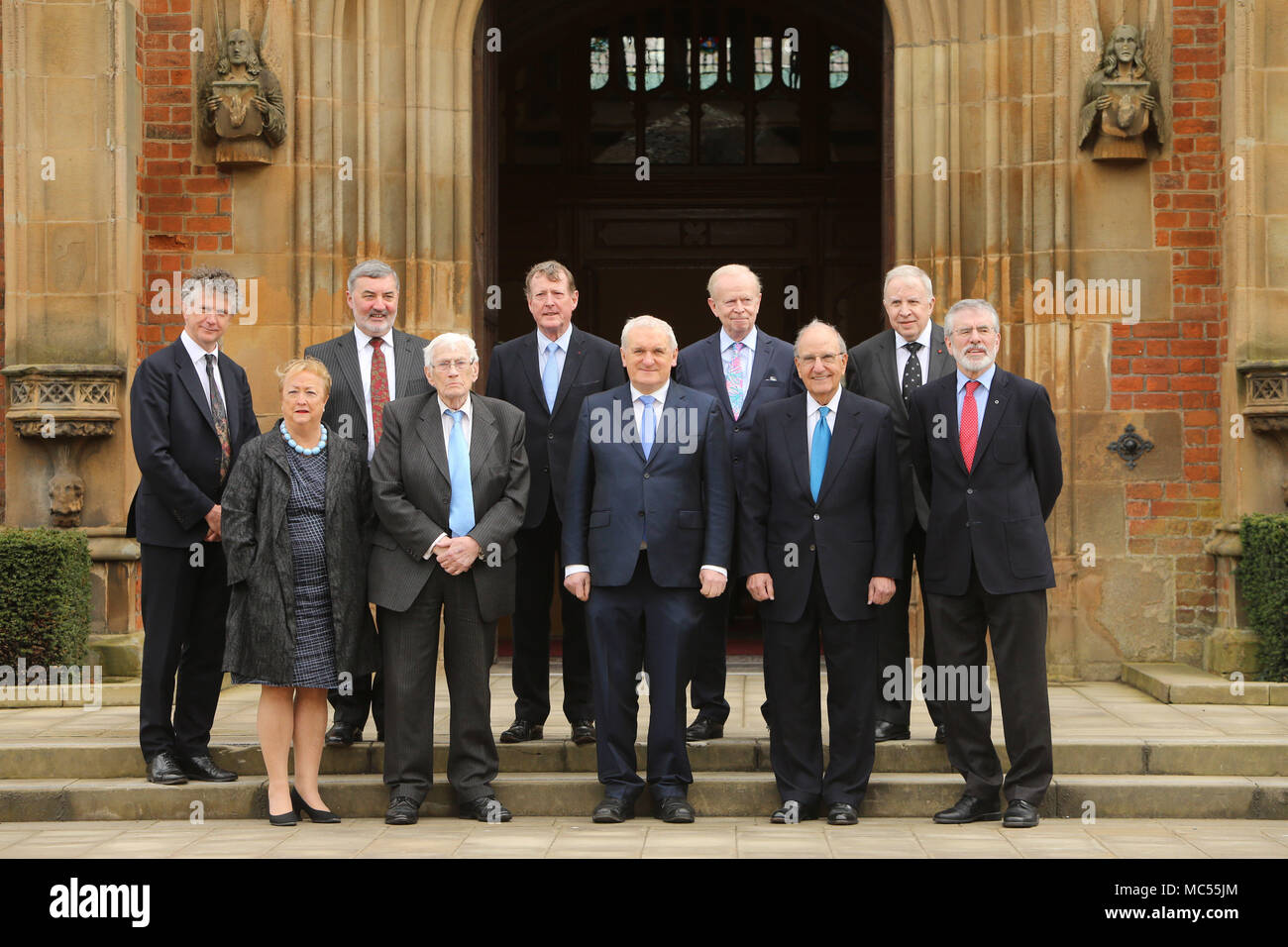 Jonathan Powell, Lord John Alderdice, Lord David Trimble, Sir Reg Empey, Paul Murphy (back row left to right) & Monica McWilliams, Seamus Mallon, former Taoiseach Mr Bertie Ahern, Senator George J. Mitchell, Gerry Adams  at  Queen's University Belfast, Tuesday, April 10th, 2018. Tuesday marks 20 years since politicians from Northern Ireland and the British and Irish governments agreed what became known as the Good Friday Agreement. It was the culmination of a peace process which sought to end 30 years of the Troubles. Two decades on, the Northern Ireland Assembly is suspended in a bitter atmos Stock Photo