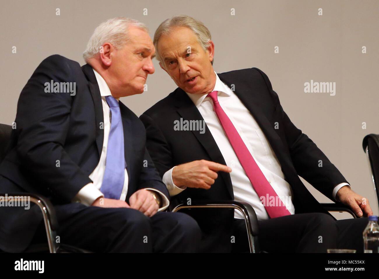 Former Taoiseach Mr Bertie Ahern sits beside former British Prime Minister Tony Blair  at  Queen's University Belfast, Tuesday, April 10th, 2018. Tuesday marks 20 years since politicians from Northern Ireland and the British and Irish governments agreed what became known as the Good Friday Agreement. It was the culmination of a peace process which sought to end 30 years of the Troubles. Two decades on, the Northern Ireland Assembly is suspended in a bitter atmosphere between the two main parties. Stock Photo