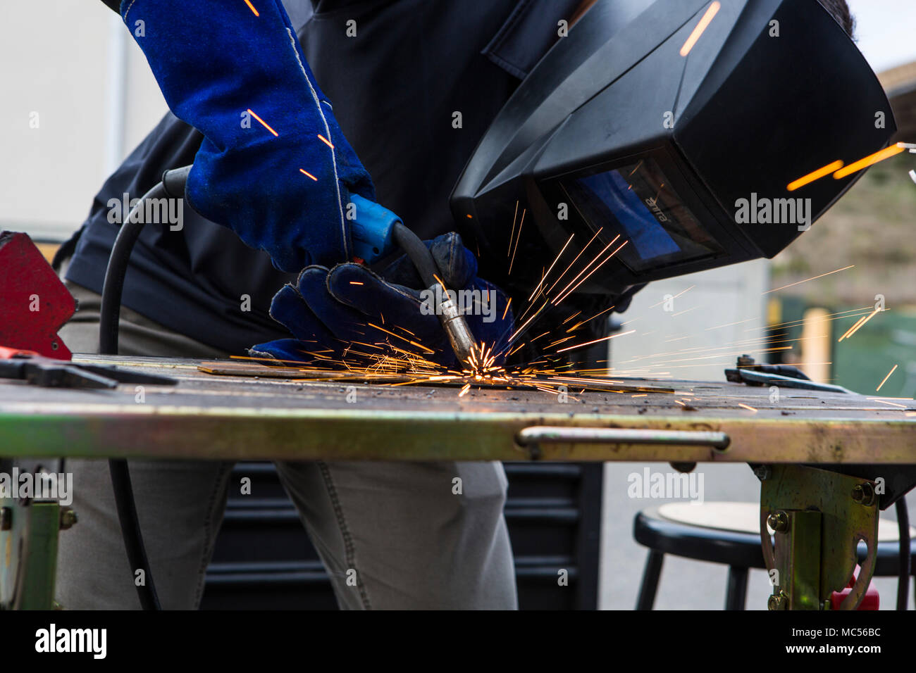 Albert Vega, a training director with Building Momentum, uses a mig ...