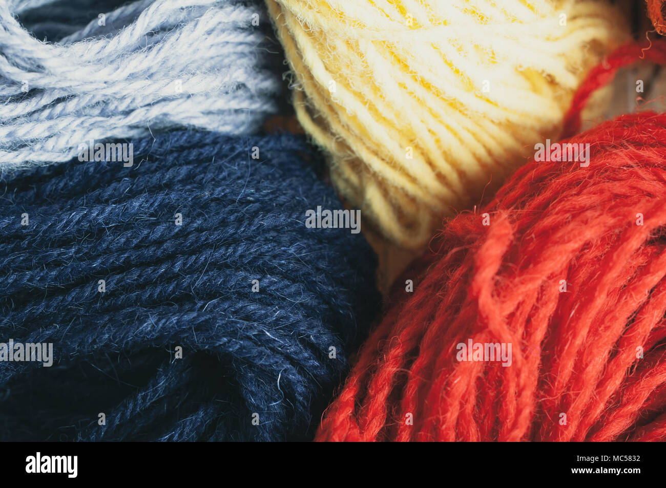 Knitting Wool Yarns Background With Shades Of Blue Red And