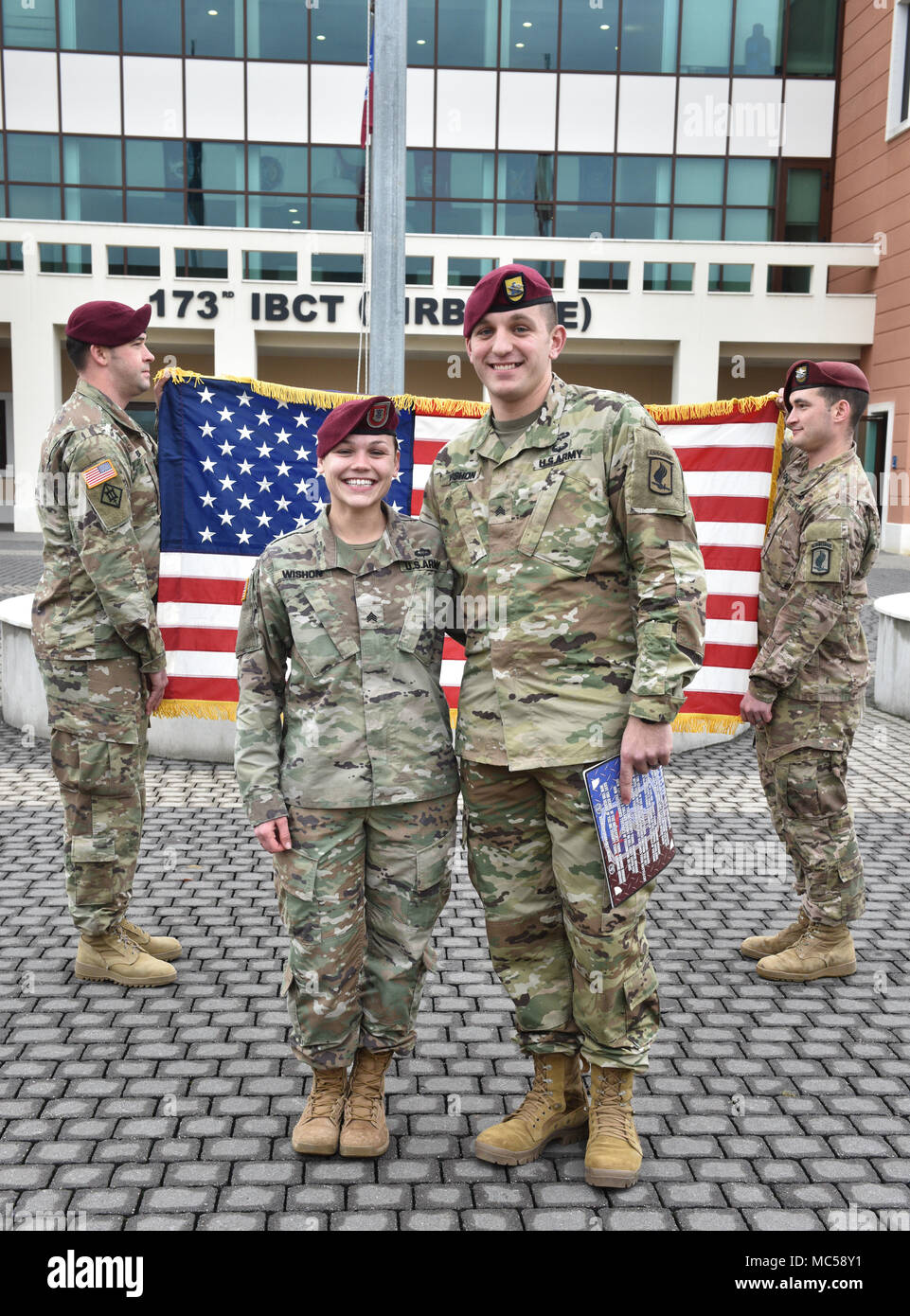 VICENZA, Italy- Sgt. Vanessa Wishon, 1st Battalion, 503rd Infantry Regiment, 173rd Airborne Brigade, and Sgt. Cody Wishon, Brigade Support Battalion, also from the 173rd Airborne Brigade, both reenlist to stay in the Army. Vanessa Wishon reenlisted for 6 years, and Cody Wishon reenlisted for 3. Stock Photo