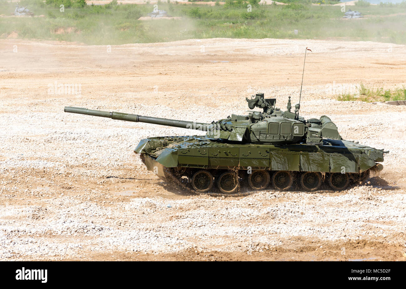 Tank on a field. Modern military equipment Stock Photo