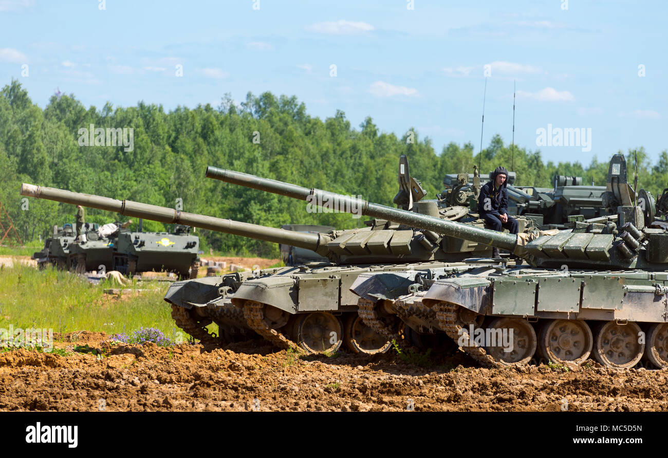 Alabino, Russia - 18 june, 2015: The tankman sits on the tank. International Military Forum ARMY 2015 Stock Photo