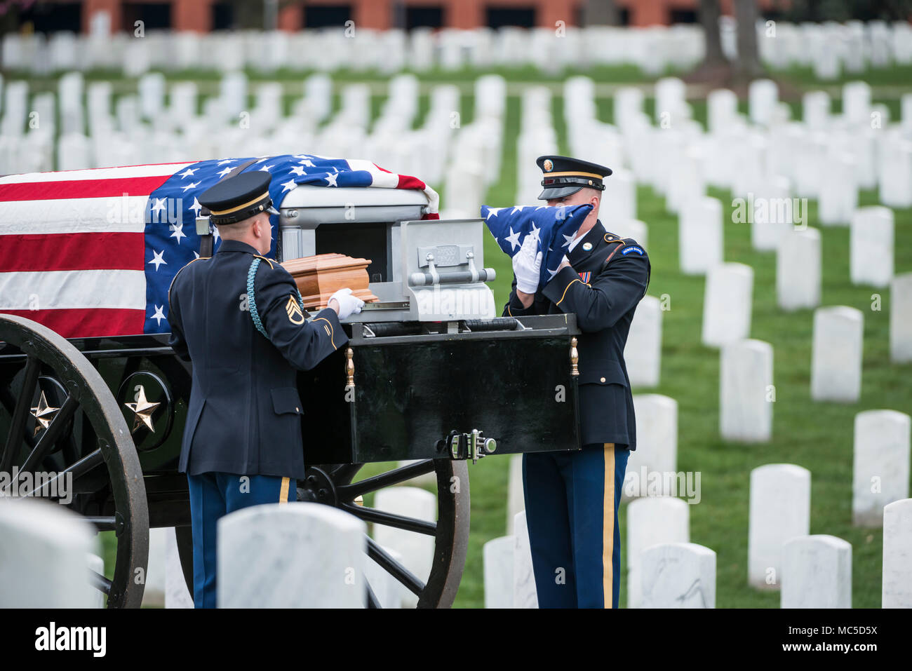 Members of The U.S. Army Honor Guard support the full honors funeral of U.S. Army Col. and Estonian Gen. Aleksander Einseln in Section 34 of Arlington National Cemetery, Arlington, Virginia, April 2, 2018.  Born in Estonia, Einseln immigrated to the United States in 1949 and enrolled in the U.S. Army in 1950 at the outbreak of the Korean War. He served with Special Forces in the Vietnam War and retiring as a Colonel in 1985. In 1993, Einseln returned to Estonia at the request of Estonian President Lennart Meri to serve as the first commander of the Estonian Defence Forces, holding this post un Stock Photo