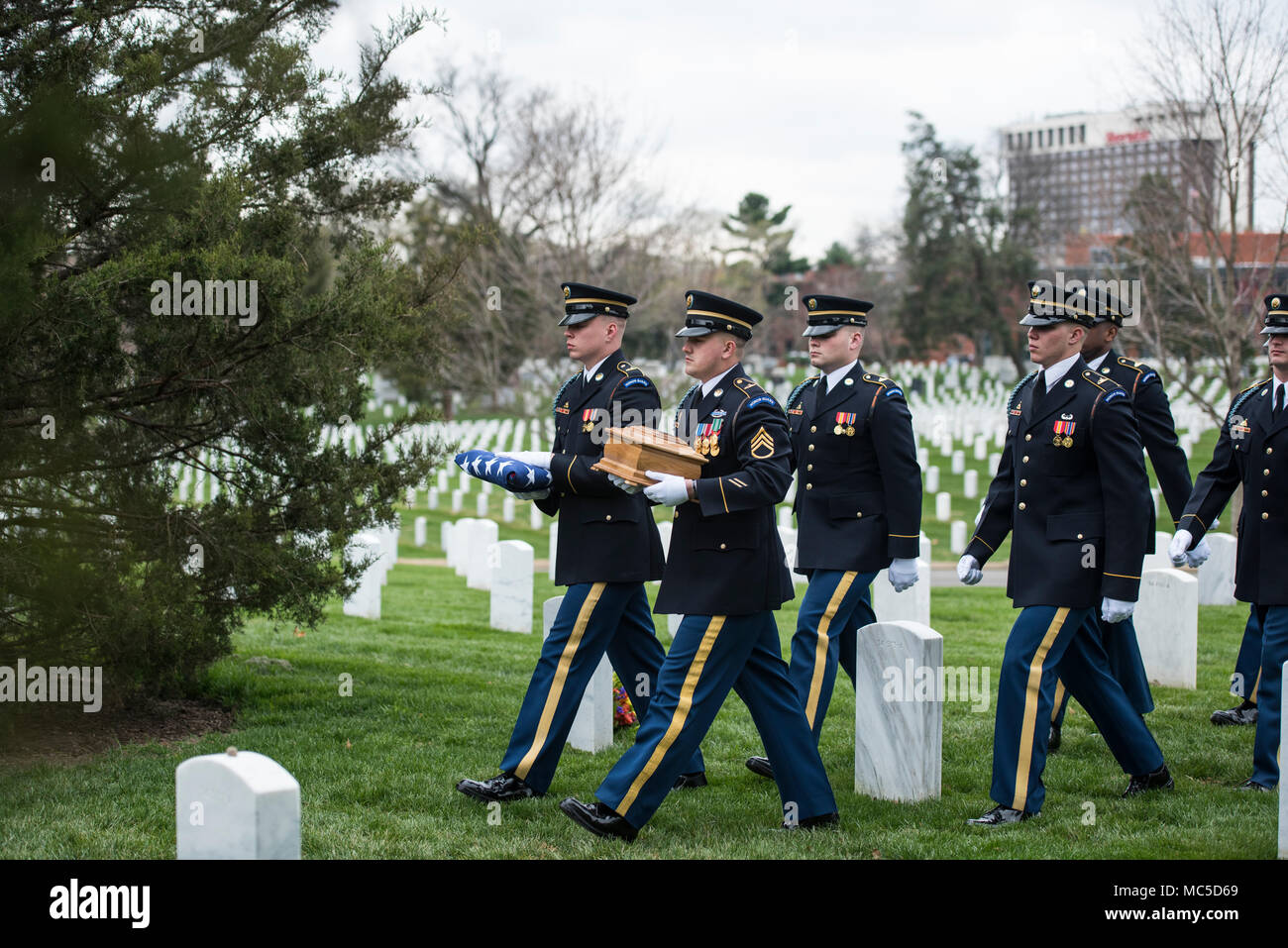The U.S. Army Honor Guard carry the ashes of U.S. Army Col. and Estonian Gen. Aleksander Einseln during a full honors funeral in Section 34 of Arlington National Cemetery, Arlington, Virginia, April 2, 2018.  Born in Estonia, Einseln immigrated to the United States in 1949 and enrolled in the U.S. Army in 1950 at the outbreak of the Korean War. He served with Special Forces in the Vietnam War and retiring as a Colonel in 1985. In 1993, Einseln returned to Estonia at the request of Estonian President Lennart Meri to serve as the first commander of the Estonian Defence Forces, holding this post  Stock Photo