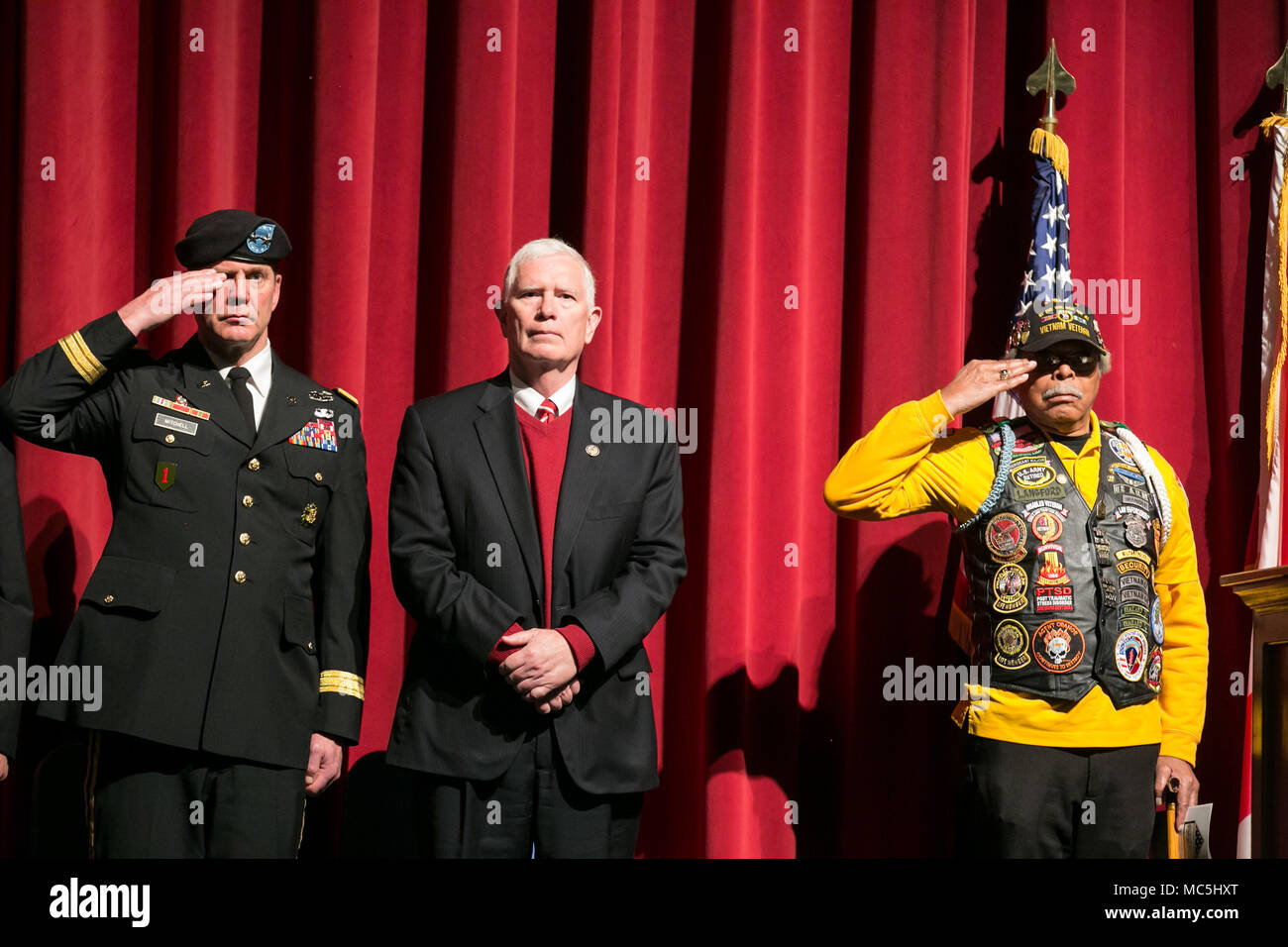 U.S. Army Maj. Gen. Daniel G. Mitchell, Army Materiel Command Deputy Chief of Staff for Logistics and Operations, G-3/4, salutes during the playing of TAPS at the 50th Anniversary Vietnam Veterans Celebration and 7th Annual Welcome Home Vietnam Veterans event in Huntsville, Alabama April 7, 2018. The event honored Vietnam Veterans as well as Korean War, World War II, Gulf War, Iraq and Afghanistan veterans. (U.S. Army photo by Sgt. 1st Class Teddy Wade) Stock Photo