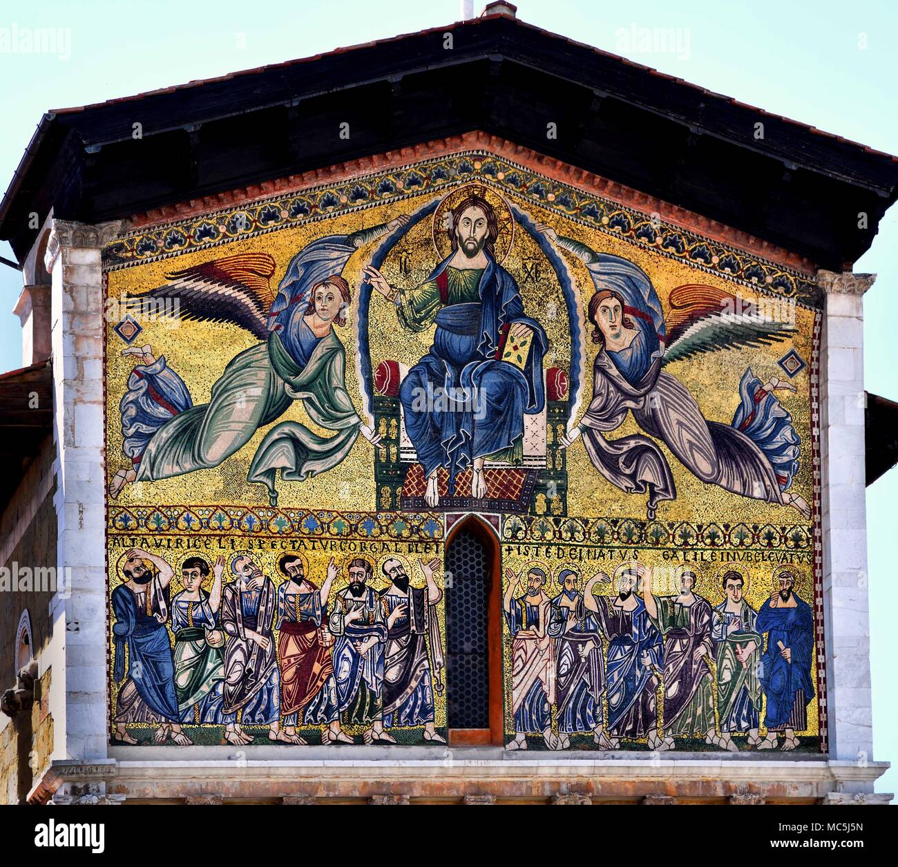 The Ascension of Christ the Saviour by Berlinghiero Berlinghieri on facade of Basilica di San Frediano on Piazza San Frediano, church in Lucca, Italy, Italian, Tuscany. ( Golden Romanesque mosaics  ) Stock Photo