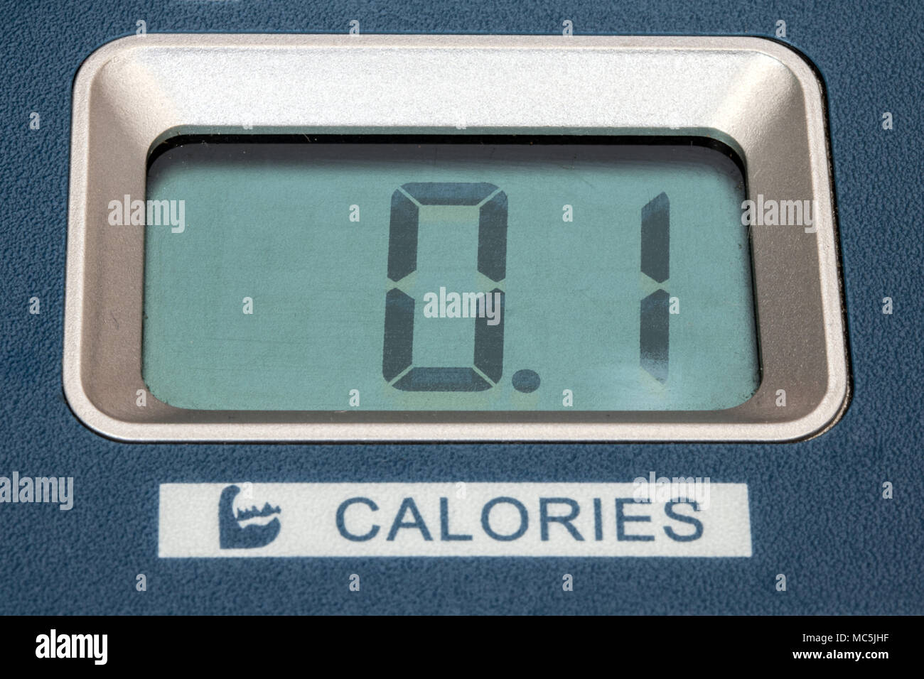 The display shows burned calories on the training machine. Stock Photo