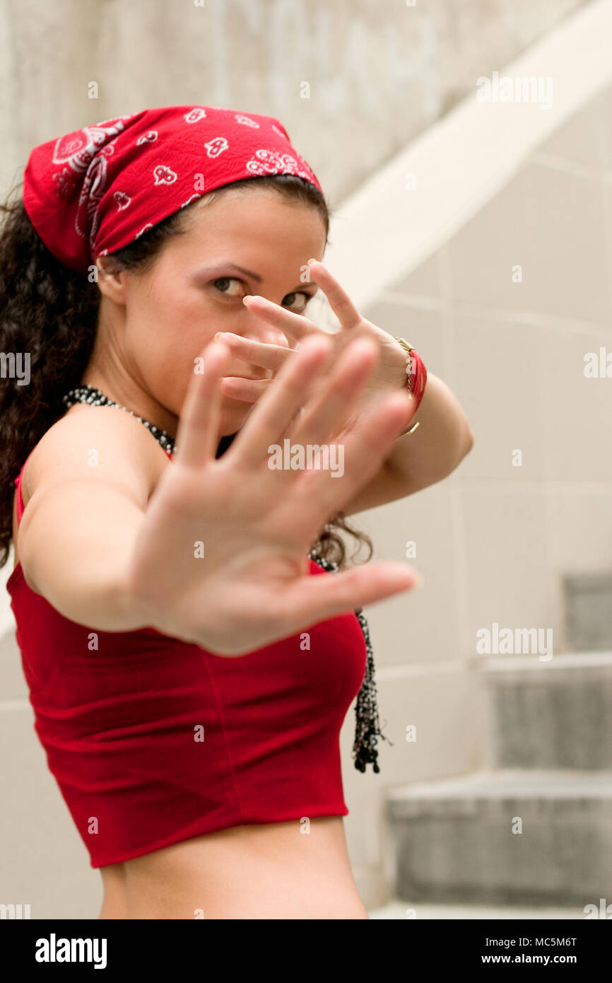 woman in red hides her face by hands Stock Photo - Alamy