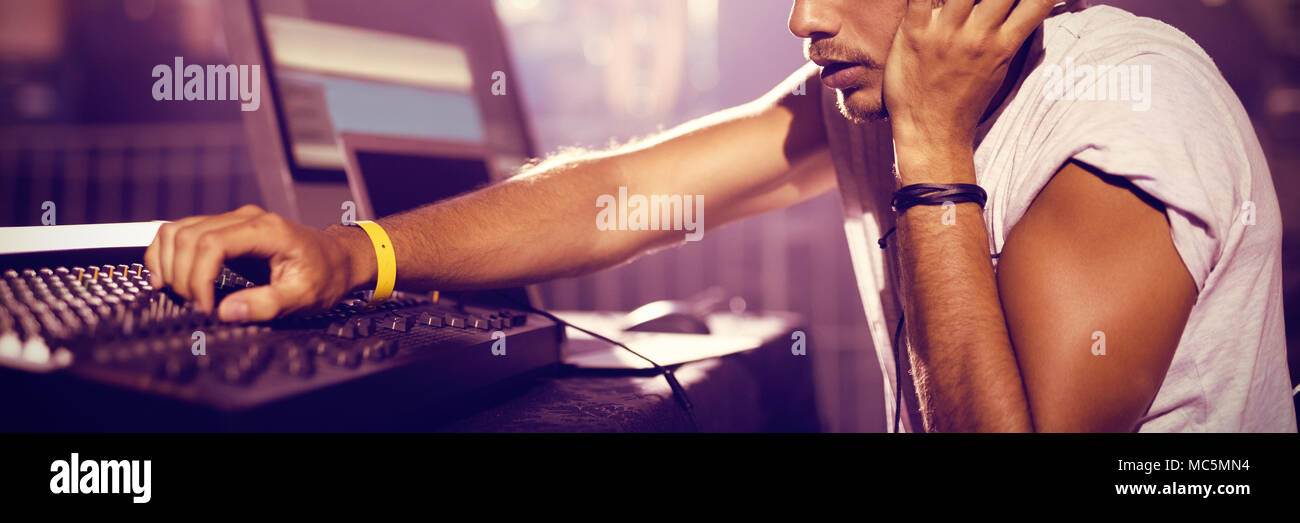 Male DJ operating sound mixer Stock Photo Alamy Male DJ operating sound mixer Stock Photo Alamy