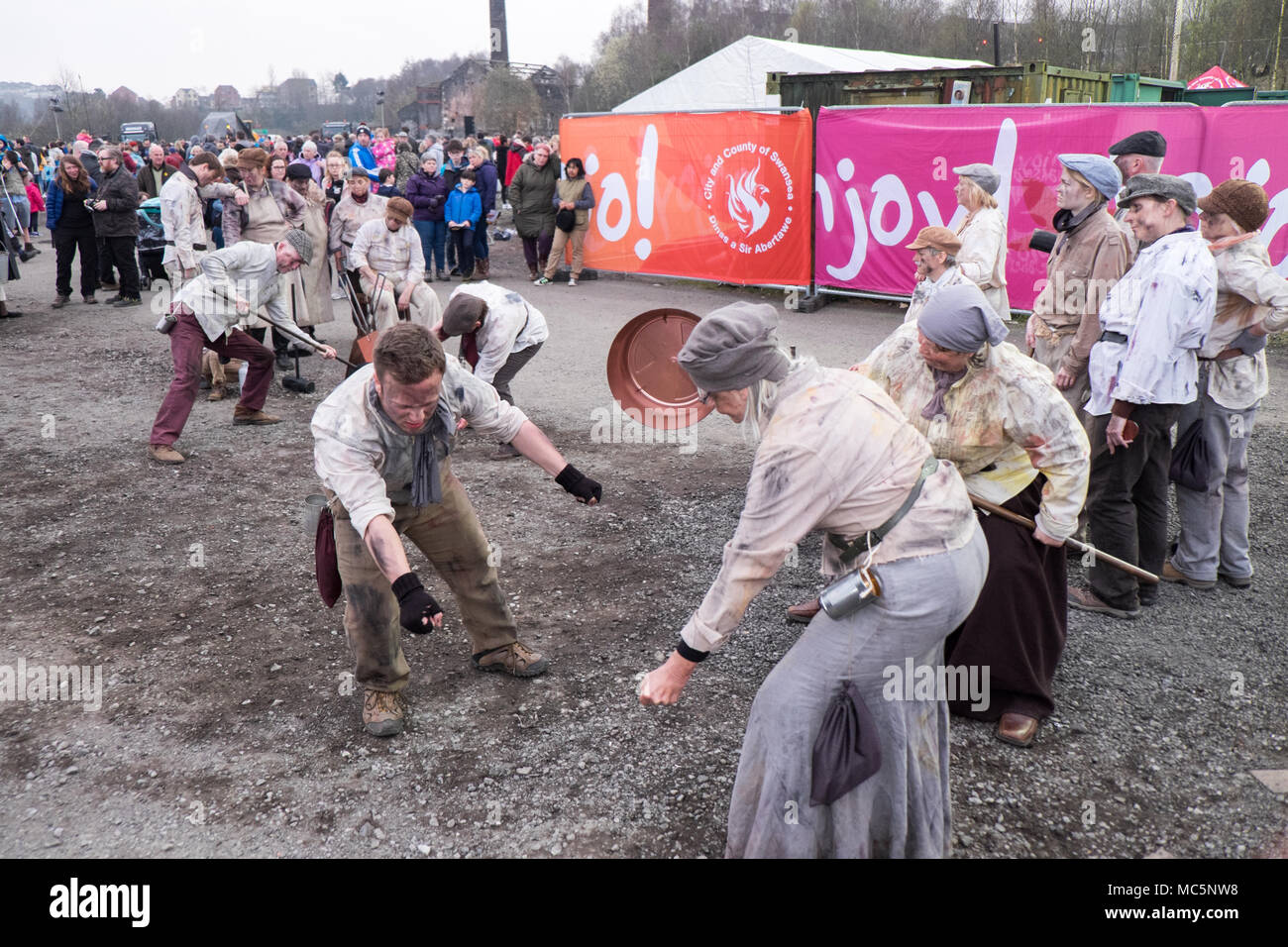 Victorian,,copper workers,in,vintage,clothing,clothes,perform,'The Man Engine',at Hafod-Morfa Copperworks,north Swansea,Wales, U.K.Swansea, Wales, UK. Stock Photo