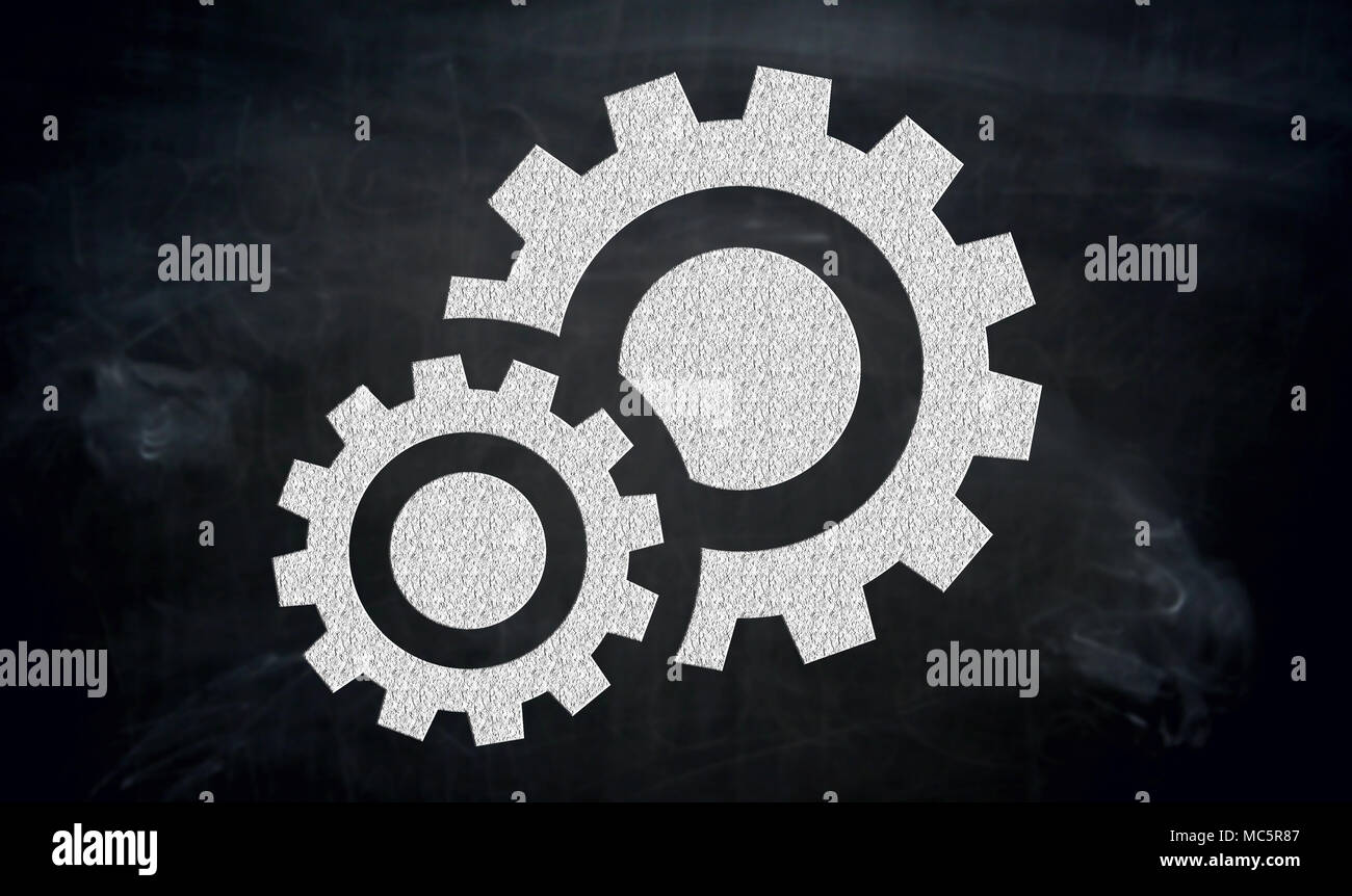 Gears with chalk on blackboard painted. Stock Photo