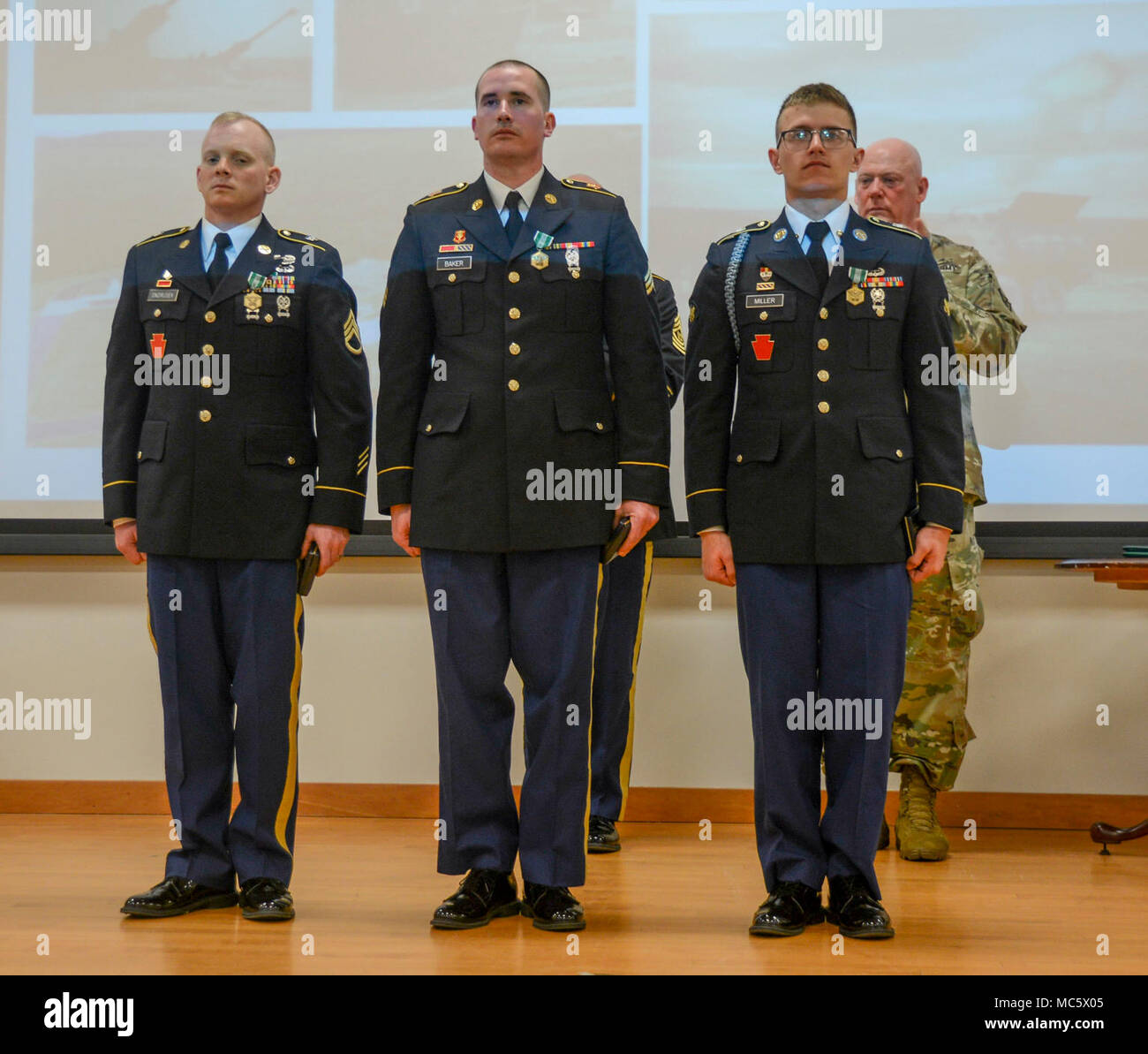From left to right are Staff Sgt. Daniel Ondrusek, a field artillery