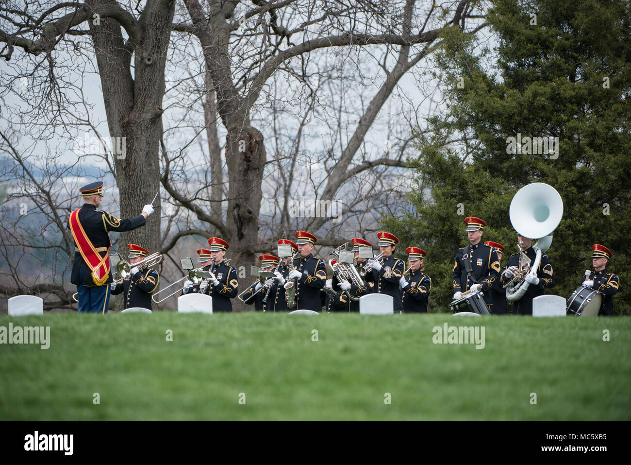 The U.S. Army Band, “Pershing’s Own”, support the full honors funeral of U.S. Army Col. and Estonian Gen. Aleksander Einseln in Section 34 of Arlington National Cemetery, Arlington, Virginia, April 2, 2018.  Born in Estonia, Einseln immigrated to the United States in 1949 and enrolled in the U.S. Army in 1950 at the outbreak of the Korean War. He served with Special Forces in the Vietnam War and retiring as a Colonel in 1985. In 1993, Einseln returned to Estonia at the request of Estonian President Lennart Meri to serve as the first commander of the Estonian Defence Forces, holding this post u Stock Photo